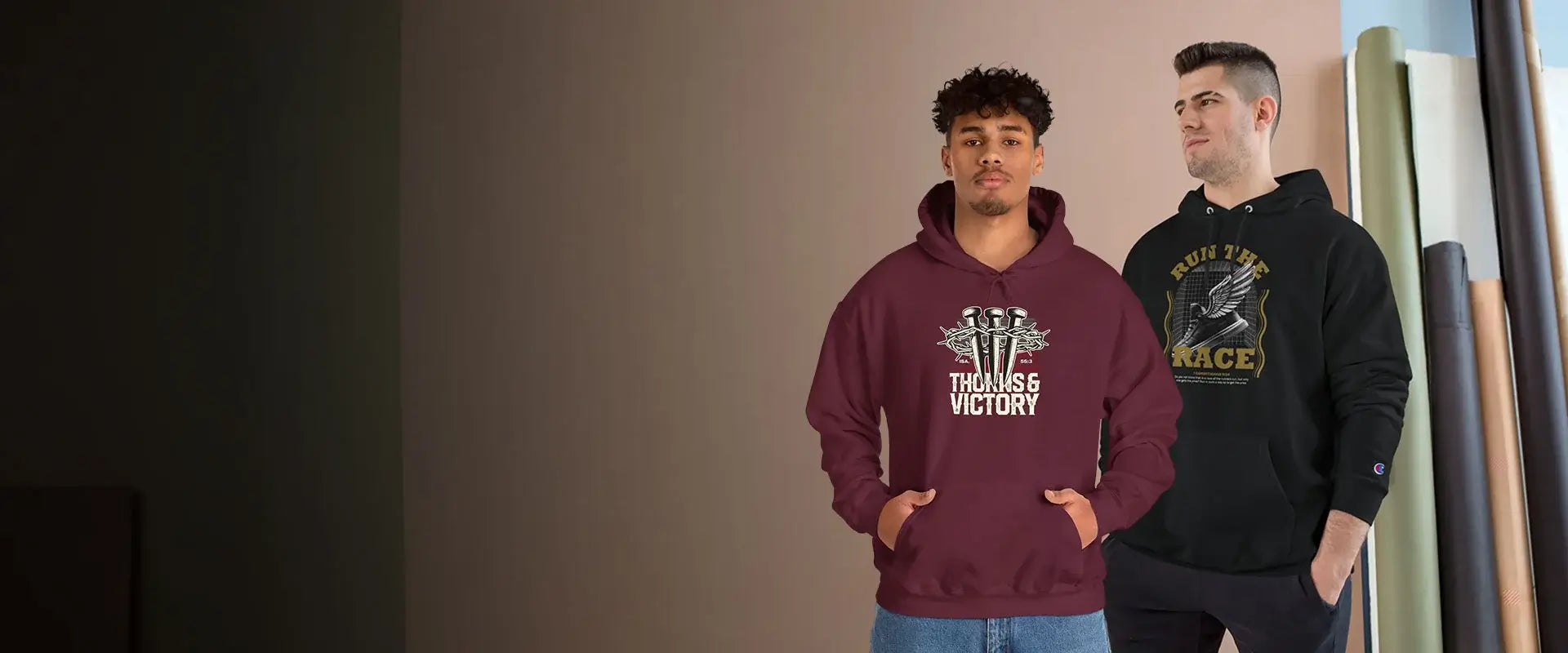 Two men wearing hoodies with motivational graphics and text.