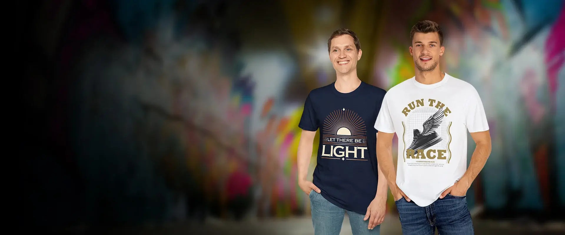 Two people wearing t-shirts with text in front of a colorful, blurred background